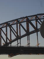 Those are PEOPLE on top of the Sydndy Harbor Bridge (we did this in '11-FUN)